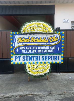 Papan Bunga Duka di Sambutan