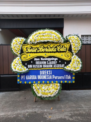 Papan Bunga Duka di Sambutan